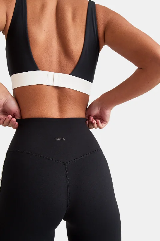 Flex Your Budget With Premium Yoga Clothing Deals DAYFLEX OPEN BACK SQUARE NECK SPORTS BRA - SHADOW BLACK AND IVORY